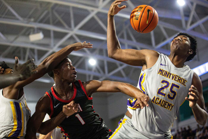 Derik Queen of Montverde Academy goes for a rebound during the championship game of the City of Palms tournament against VJ Edgecomb of Long Island Lutheran at Suncoast Credit Union Arena in December.